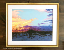 Load image into Gallery viewer, print of painting of peach, gold, and purple sunset in front of pale blue sky over darkening sand dunes with sea oats in white matte with gold frame